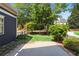 Backyard of home featuring grass and manicured landscaping at 425 Hunt Ne St, Marietta, GA 30060