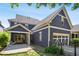 Exterior of home featuring a covered patio and stone paver walkway at 425 Hunt Ne St, Marietta, GA 30060