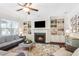 Cozy living room with built-in bookshelves, fireplace, recessed lighting, and comfortable seating at 425 Hunt Ne St, Marietta, GA 30060
