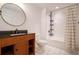 Bathroom featuring a modern vanity, toilet, and shower with patterned tile flooring at 5035 Villa Rica Hwy, Dallas, GA 30157