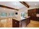 Modern kitchen with a granite island, stainless steel appliances, and an open layout to living area at 5035 Villa Rica Hwy, Dallas, GA 30157
