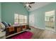 Comfortable bedroom with vaulted ceilings and an ensuite bathroom at 549 Greenridge Ln, Loganville, GA 30052