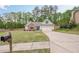 Charming one-story home with well-manicured lawn and long driveway leading to the two-car garage at 549 Greenridge Ln, Loganville, GA 30052
