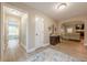 Hallway featuring hardwood floors and access to other rooms in the house at 549 Greenridge Ln, Loganville, GA 30052