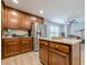 Kitchen with granite countertops, stainless steel refrigerator, and an eat-in dining space at 549 Greenridge Ln, Loganville, GA 30052