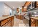 Modern kitchen showcasing custom cabinets, stainless steel appliances, and a functional layout at 549 Greenridge Ln, Loganville, GA 30052