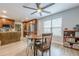 Open concept kitchen and dining area with stainless appliances and a bright window at 549 Greenridge Ln, Loganville, GA 30052