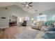 Comfortable living room with a vaulted ceiling, stylish decor, and views to the dining room and more seating at 549 Greenridge Ln, Loganville, GA 30052