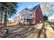 Expansive backyard features a raised deck with a pergola, providing an ideal outdoor living space at 2118 Sableshire Se Way, Conyers, GA 30013