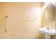 Well-lit bathroom with a single sink and neutral color scheme at 2118 Sableshire Se Way, Conyers, GA 30013