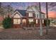Charming two-story brick home with manicured landscaping and inviting front entrance at 2118 Sableshire Se Way, Conyers, GA 30013