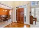 Grand foyer with hardwood floors, high ceilings, and abundant natural light at 2118 Sableshire Se Way, Conyers, GA 30013