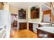 Charming kitchen with wood floors, bright countertops and stainless steel appliances at 2118 Sableshire Se Way, Conyers, GA 30013