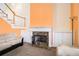 Cozy living room with marble fireplace and built-in cabinets at 2118 Sableshire Se Way, Conyers, GA 30013