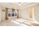 Spacious primary bedroom with trey ceilings and natural light at 2118 Sableshire Se Way, Conyers, GA 30013