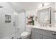 Modern bathroom featuring sleek vanity and a walk-in glass shower at 215 Scott Xing, Roswell, GA 30076