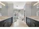 Bright bathroom showcasing dual vanities and soaking tub at 215 Scott Xing, Roswell, GA 30076