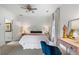 Comfortable bedroom with plush carpet, ceiling fan, a bright window, and classic decor at 215 Scott Xing, Roswell, GA 30076