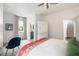 Comfortable bedroom with plush carpet, ceiling fan, a bright window, and classic decor at 215 Scott Xing, Roswell, GA 30076