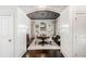 Formal dining room with elegant chandelier, dark gray ceiling, and sophisticated furnishings at 215 Scott Xing, Roswell, GA 30076