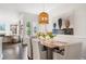 Sunlit dining room with a view into another living space and a decorative painting at 215 Scott Xing, Roswell, GA 30076