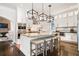 Gourmet kitchen with a large island, stylish pendant lighting, and stainless steel appliances at 215 Scott Xing, Roswell, GA 30076