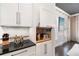 Kitchen cabinet with built-in appliances, including a toaster and kettle at 215 Scott Xing, Roswell, GA 30076