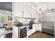 Well-equipped kitchen with stainless steel appliances and custom cabinets at 215 Scott Xing, Roswell, GA 30076