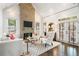 Bright living room with a stone fireplace and vaulted wood ceiling at 215 Scott Xing, Roswell, GA 30076