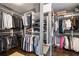 Spacious walk-in closet with ample storage and custom shelving at 215 Scott Xing, Roswell, GA 30076