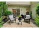 Charming patio area with comfortable seating and lush greenery, perfect for relaxation and outdoor gatherings at 3618 Berkeley Ct # Iv-A, Duluth, GA 30096