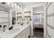 Bathroom with double sinks and entry to bedroom at 3618 Berkeley Ct # Iv-A, Duluth, GA 30096