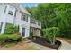 Attractive townhouse with landscaped front yard, walkway, and lots of greenery at 3618 Berkeley Ct # Iv-A, Duluth, GA 30096