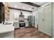 Well-lit kitchen features modern appliances, updated countertops, and ample storage space at 3618 Berkeley Ct # Iv-A, Duluth, GA 30096