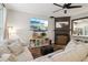 Stylish living room featuring hardwood floors, neutral furniture, fireplace with TV, open layout at 3618 Berkeley Ct # Iv-A, Duluth, GA 30096