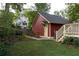 Back yard with a detached garage and a staircase leading to a back porch at 604 Mead Se St, Atlanta, GA 30312