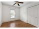 Bright bedroom with wood floors and a double-door closet that provide ample storage space at 604 Mead Se St, Atlanta, GA 30312