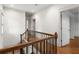 Upstairs hallway with wood floors and trim, and lots of natural light at 604 Mead Se St, Atlanta, GA 30312