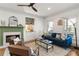 Bright living room featuring a modern fireplace, hardwood floors, and comfortable seating at 604 Mead Se St, Atlanta, GA 30312