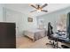 Light and bright bedroom with ceiling fan and neutral carpet at 7010 Beloit Pl, Roswell, GA 30075