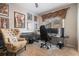 Home office with neutral carpeting, natural light, and framed art on the wall at 7010 Beloit Pl, Roswell, GA 30075