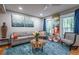 Bright living room features hardwood floors, comfortable seating, and stylish decor at 111 John Christopher Dr, Alpharetta, GA 30009