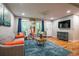 Inviting living room with modern decor, hardwood floors, and stylish blue rug at 111 John Christopher Dr, Alpharetta, GA 30009