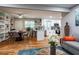 Inviting living space with an open kitchen, dining area, and hardwood floors provides room for comfortable living at 111 John Christopher Dr, Alpharetta, GA 30009