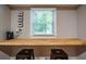 Dedicated home office space with natural light and a built-in desk at 111 John Christopher Dr, Alpharetta, GA 30009