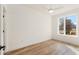 Bright bedroom with large window and hardwood floors, offering a comfortable retreat at 1237 Memorial Se Dr # 404, Atlanta, GA 30316