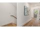Hallway with hardwood floors and staircase leading to upper level at 1237 Memorial Se Dr # 404, Atlanta, GA 30316