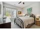 Bedroom features soft carpet, neutral walls, and lots of natural light at 243 Retreat Ln, Canton, GA 30114