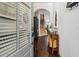 Inviting foyer with hardwood floors, staircase, console table, mirror, coat hooks and lots of natural light at 243 Retreat Ln, Canton, GA 30114