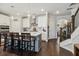 Bright kitchen featuring a large island with barstool seating and stainless steel appliances at 243 Retreat Ln, Canton, GA 30114